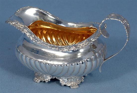 A George III demi fluted silver cream jug, by Joseph Angell I, Length 160mm Weight 7.2oz/225grms